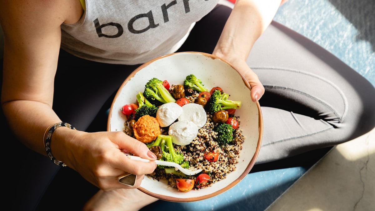 healthy grain and salad bowl after yoga class